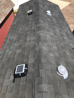 Solar fan on shed roof